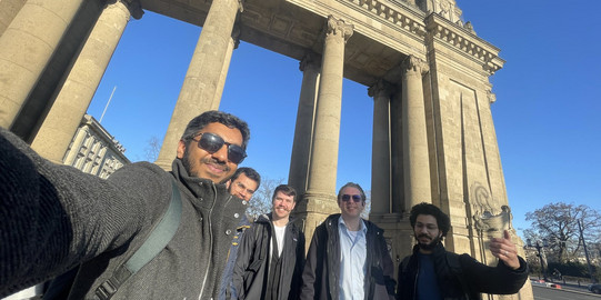 Selfie of our five-member research team on the road